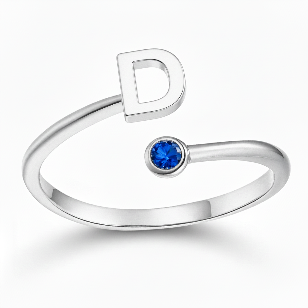 Anello regolabile con iniziale "Essence"